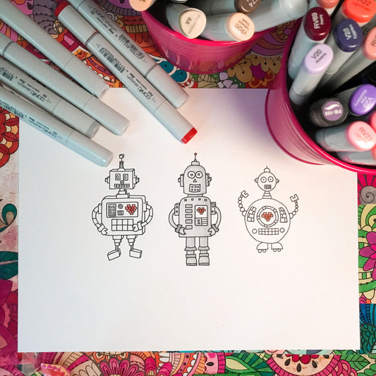 three hand illustrated vintage robots with red hearts in their chests